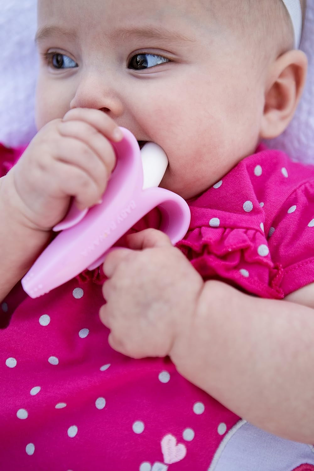 Baby Banana®Pink Teether-Toothbrush, Infant to Toddler, Made in USA, Butter-Soft Bristles for Gums and Teeth, Bendable Food Grade Silicone, Family-Owned Buisness since 2009, 11 Million+ Sold